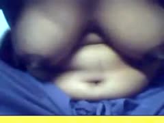 A young Indian amateur beauty shows off her enormous billibongs on camera.